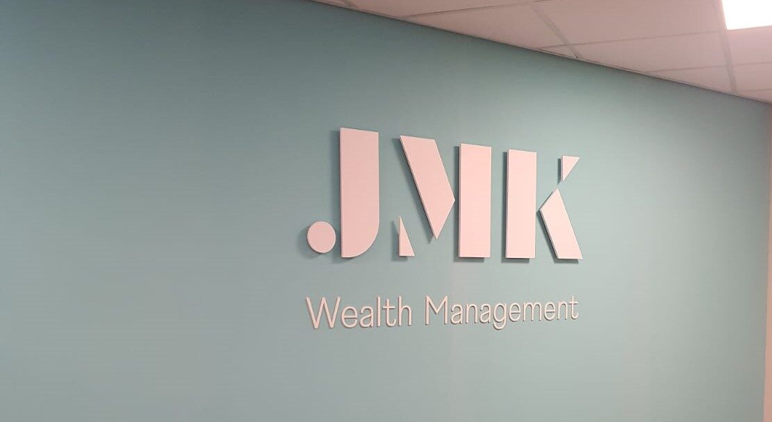 JMK Wealth Management built-up letters on an interior wall